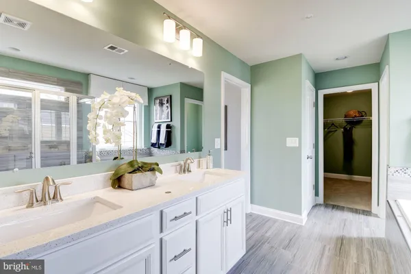 a living room with fireplace furniture and a flat screen tv