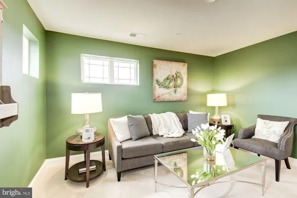 a bedroom with a bed and a desk