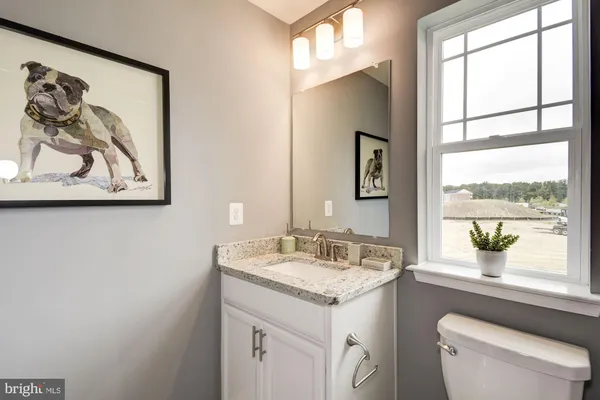 a bedroom with a bed and a cabinets