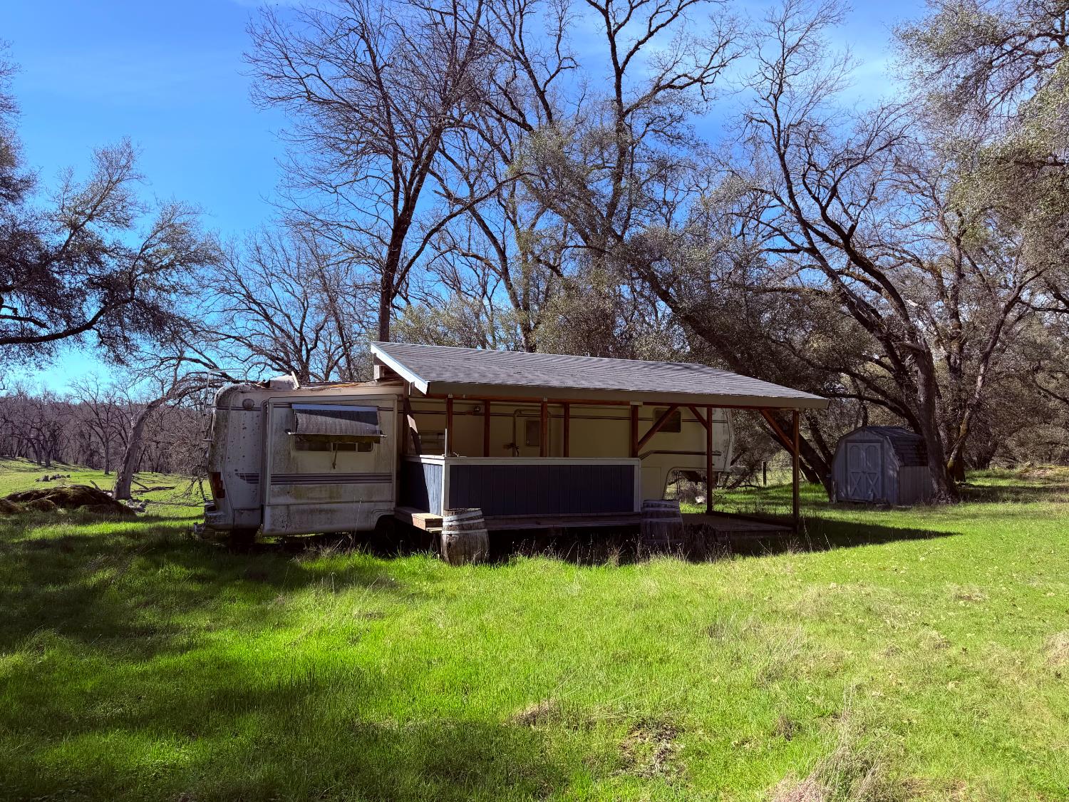 2901 Cedar Creek Road Somerset, CA 95684 - Photo 43 of 56 a view of a house with a yard and sitting area