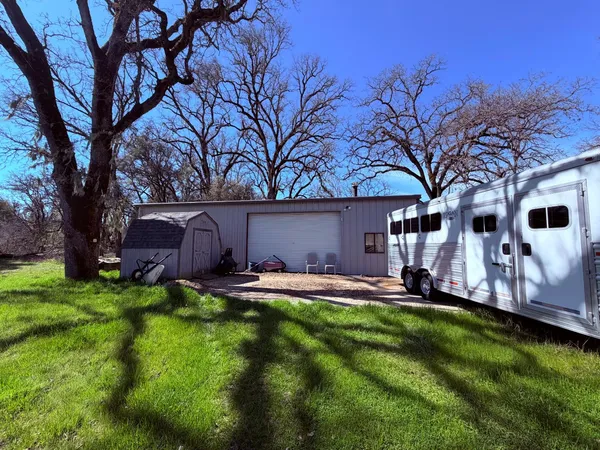 a backyard of a house with lots of green space