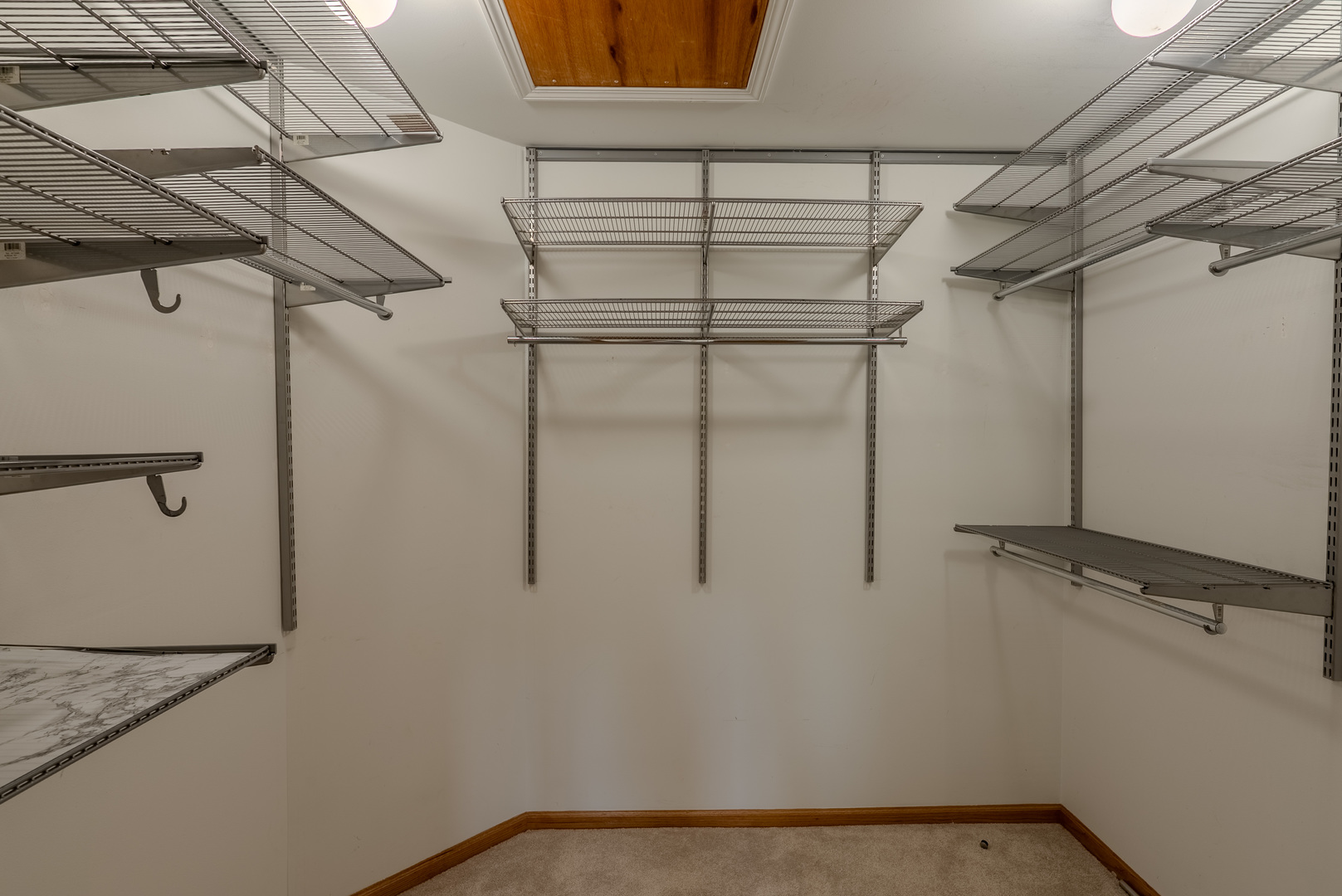 11617 Coach Drive Mokena, IL 60448 - Photo 30 of 38 a view of a room with racks on the wall