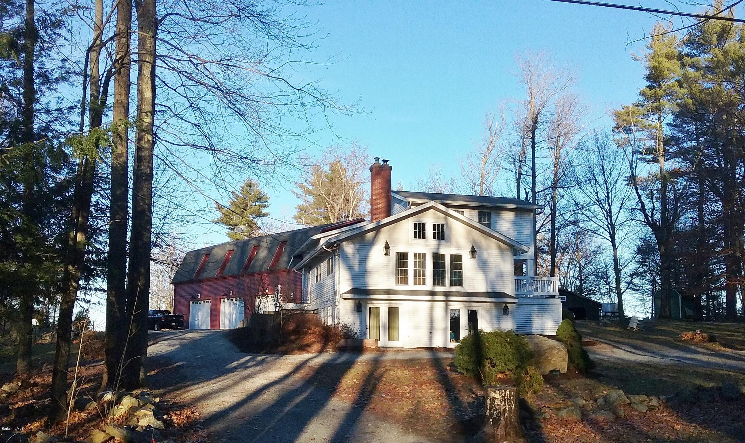 27 Kibbe Point Road Otis, MA 01029 - Photo 2 of 30 a view of a large building next to a road