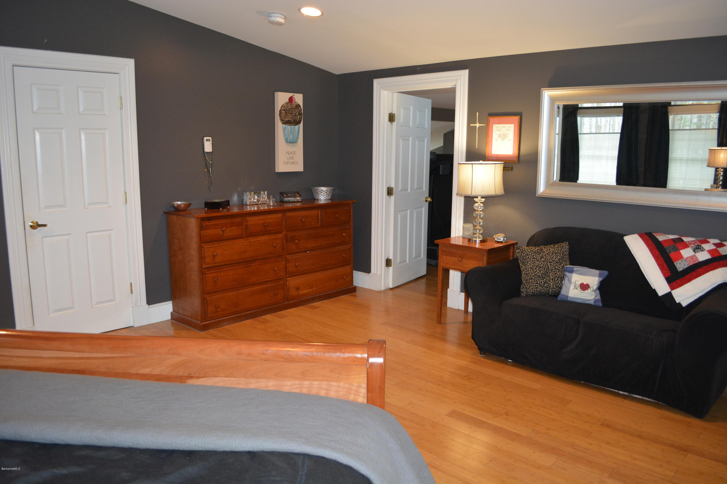 27 Kibbe Point Road Otis, MA 01029 - Photo 18 of 30 a bedroom with a bed and window