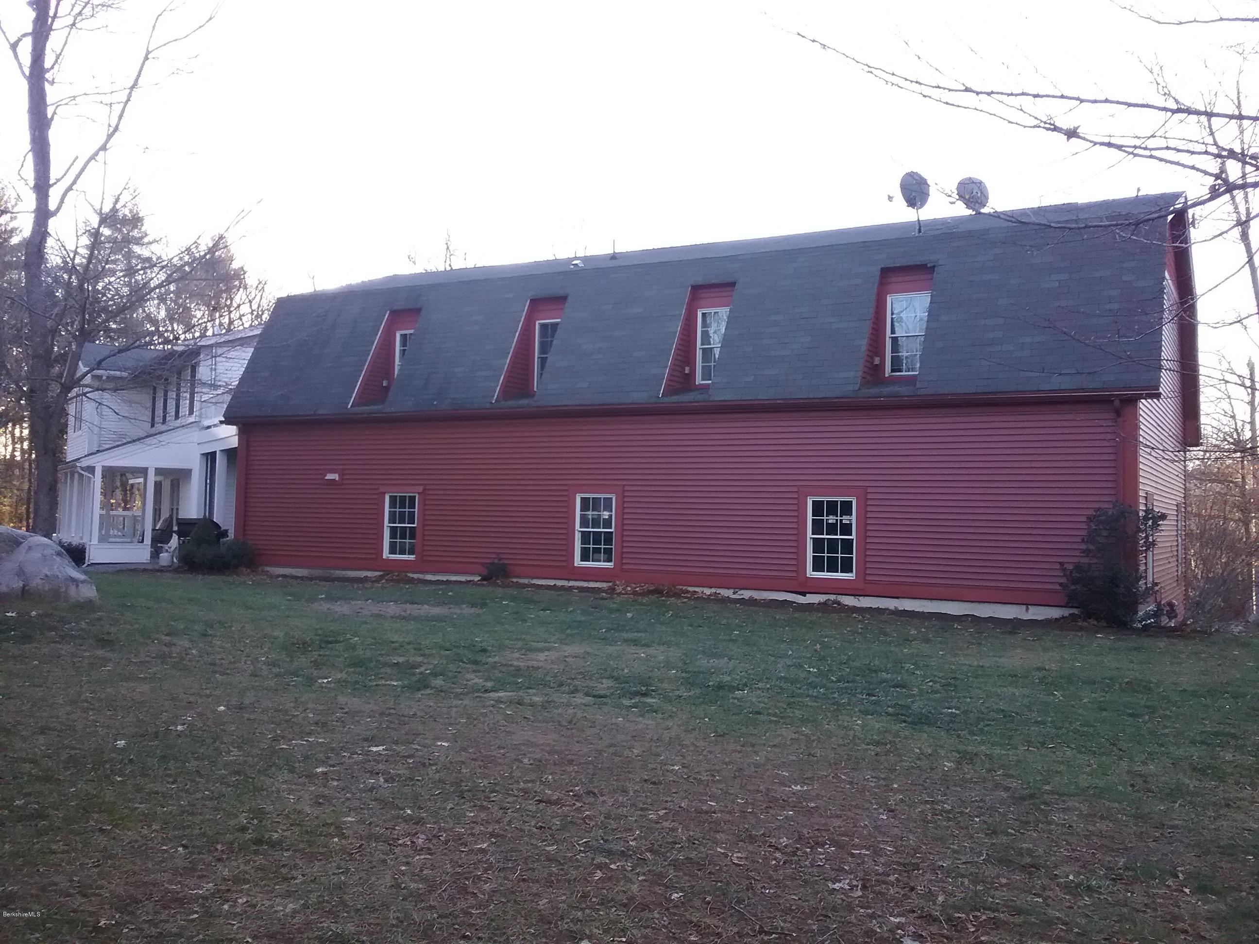27 Kibbe Point Road Otis, MA 01029 - Photo 26 of 30 a front view of house with yard