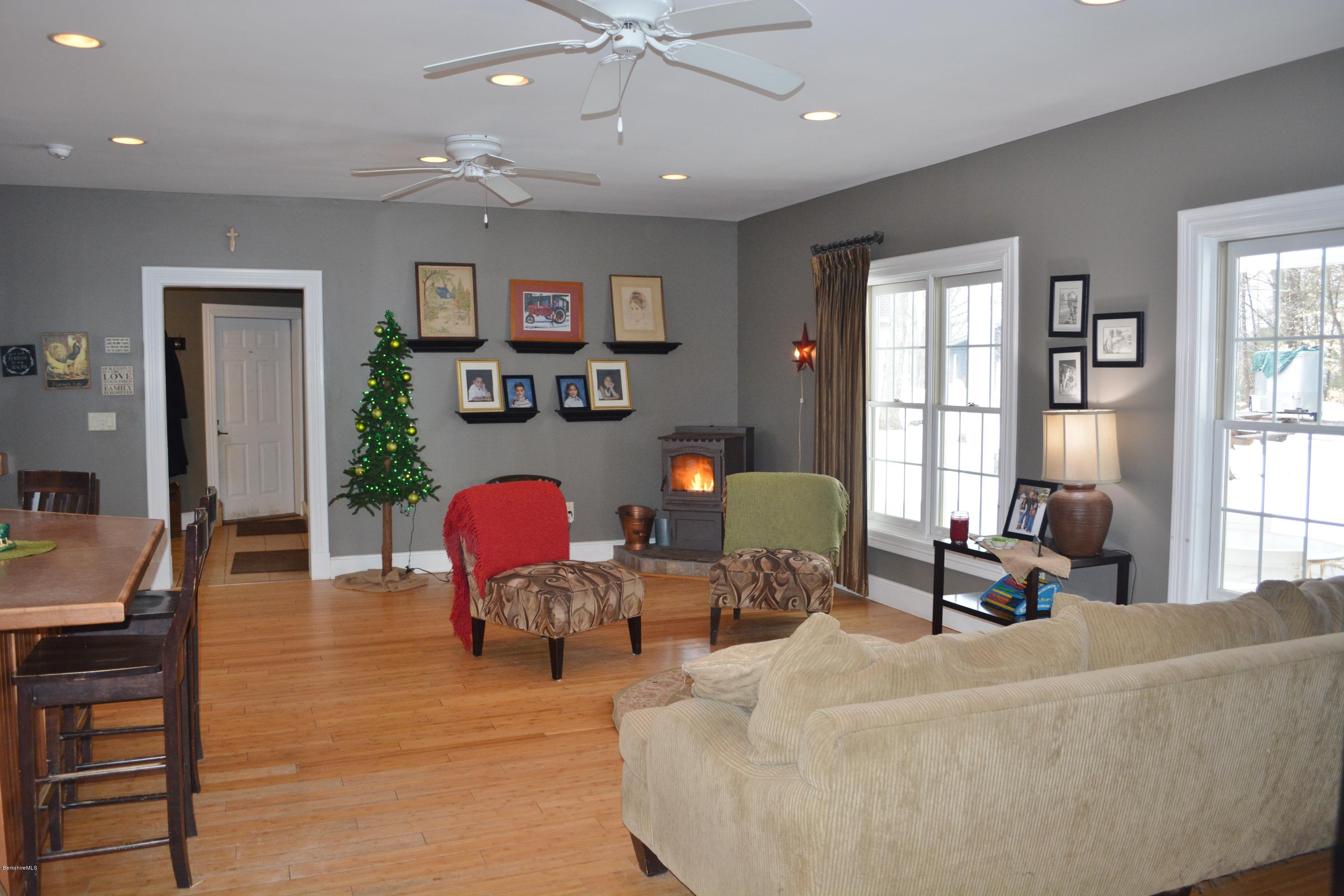 27 Kibbe Point Road Otis, MA 01029 - Photo 10 of 30 a living room with furniture and a window
