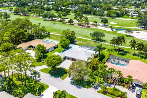 a view of a street with a park