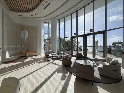 a view of a balcony with ocean view