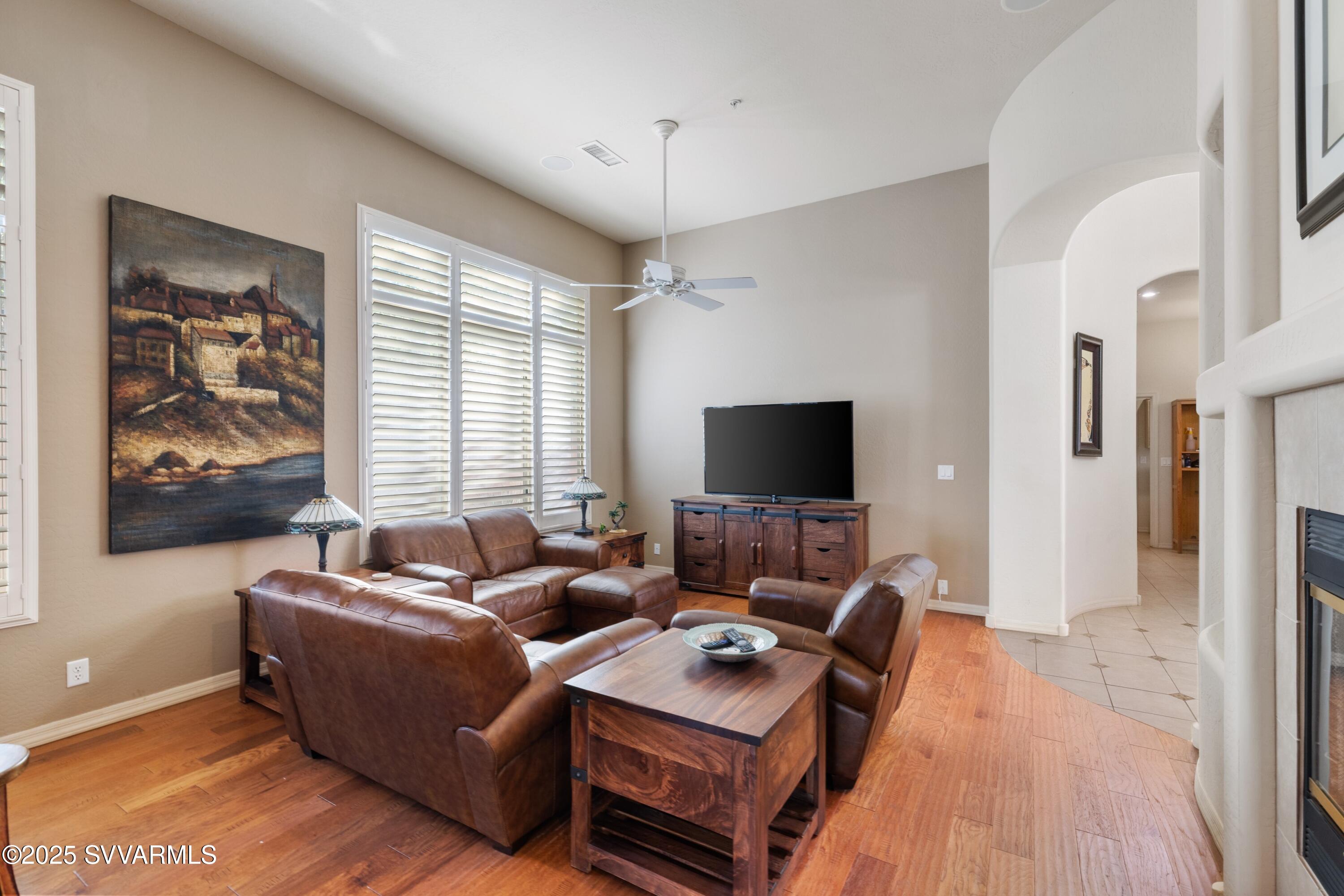 35 Rio Sinagua Sedona, AZ 86351 - Photo 11 of 67 a living room with furniture and a flat screen tv