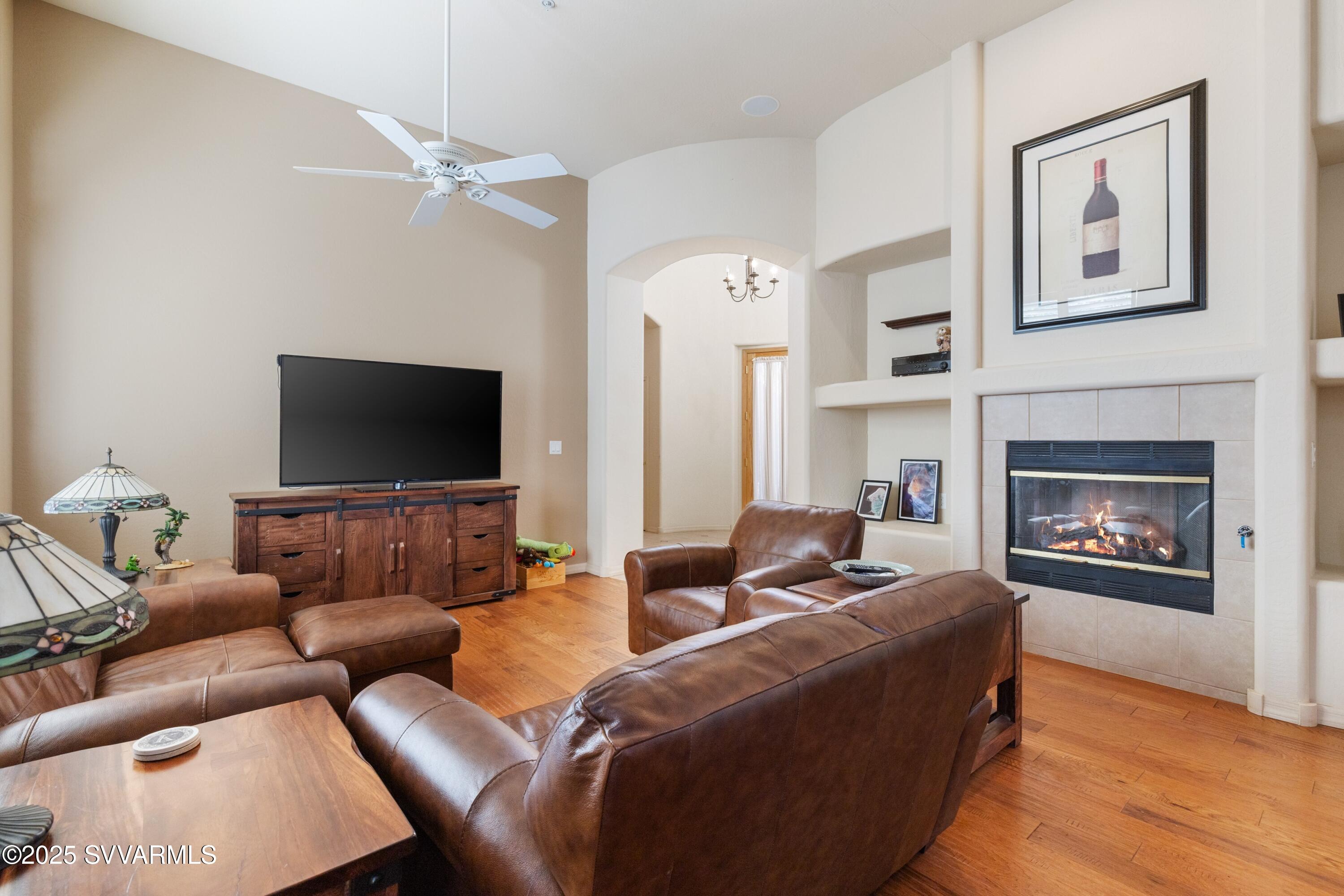 35 Rio Sinagua Sedona, AZ 86351 - Photo 12 of 67 a living room with furniture and a flat screen tv