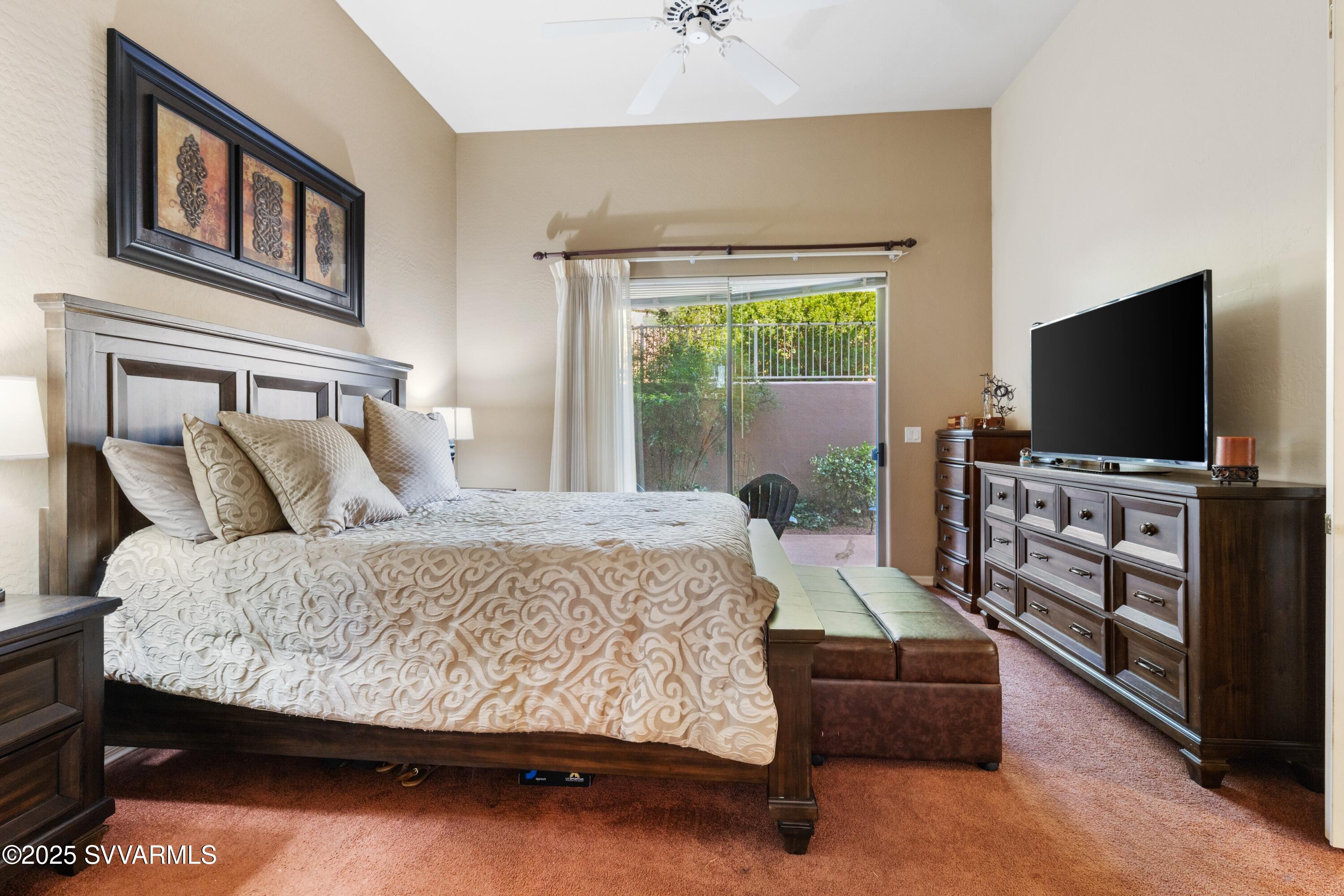 35 Rio Sinagua Sedona, AZ 86351 - Photo 22 of 67 a living room with furniture and a flat screen tv