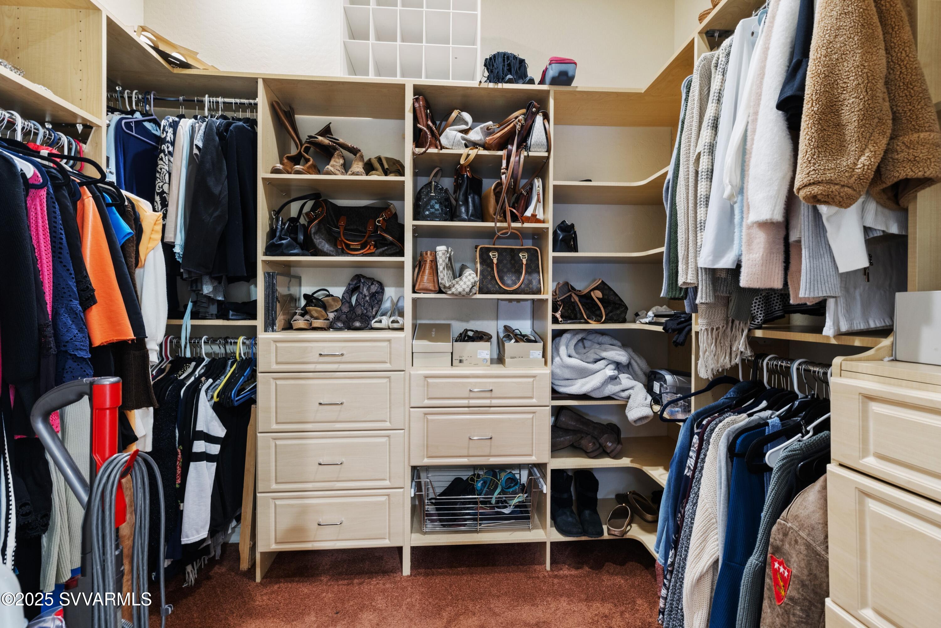 35 Rio Sinagua Sedona, AZ 86351 - Photo 23 of 67 a view of walk in closet with clothes and shoes