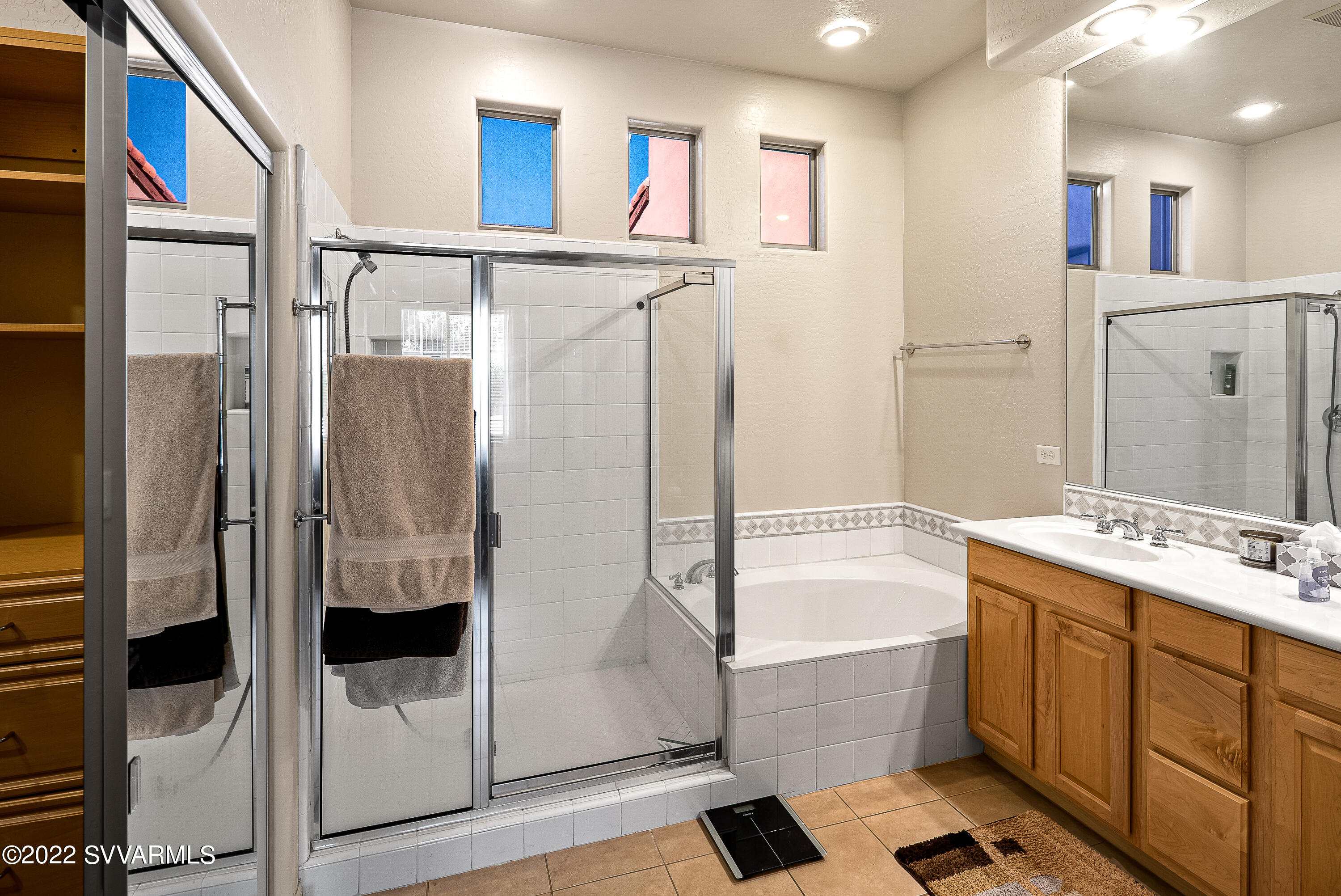 35 Rio Sinagua Sedona, AZ 86351 - Photo 27 of 67 a bathroom with a tub sink shower and mirror