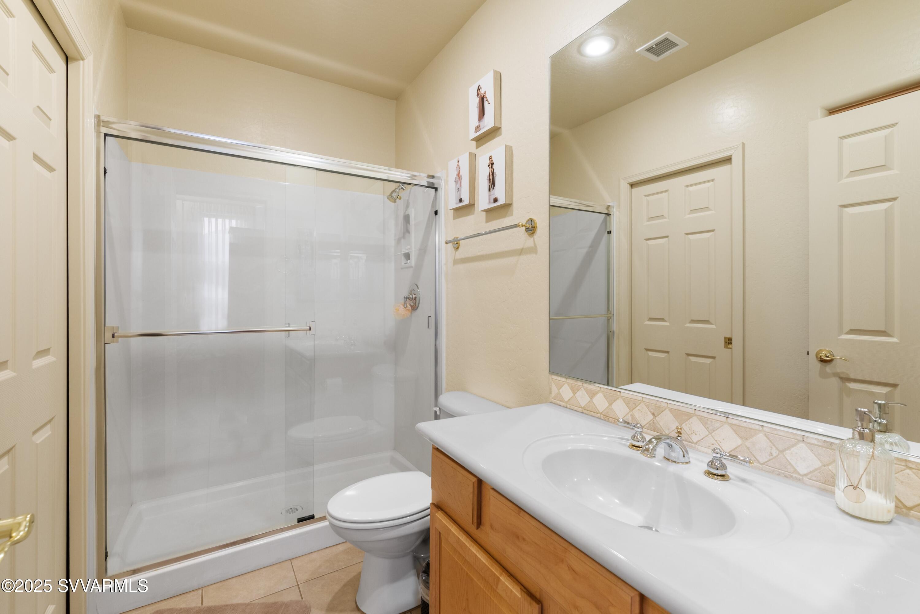 35 Rio Sinagua Sedona, AZ 86351 - Photo 33 of 67 a bathroom with a sink and a mirror
