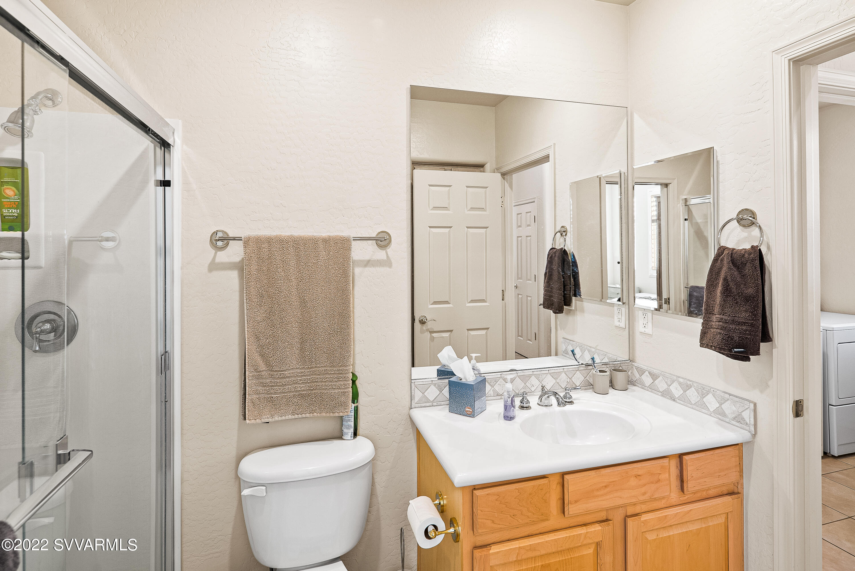 35 Rio Sinagua Sedona, AZ 86351 - Photo 34 of 67 a bathroom with a sink toilet and shower