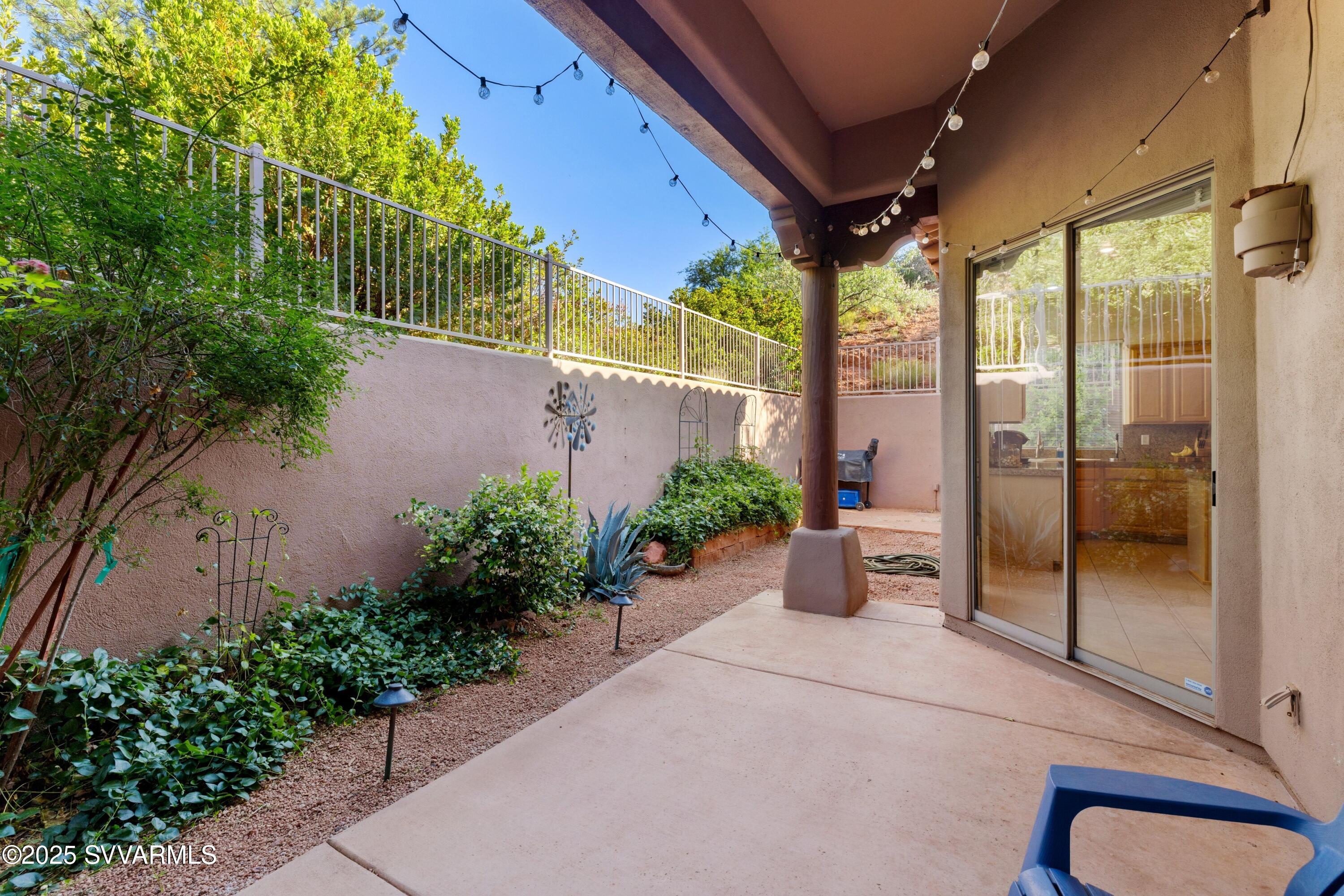 35 Rio Sinagua Sedona, AZ 86351 - Photo 39 of 67 a view of a path along with potted plants and large tree