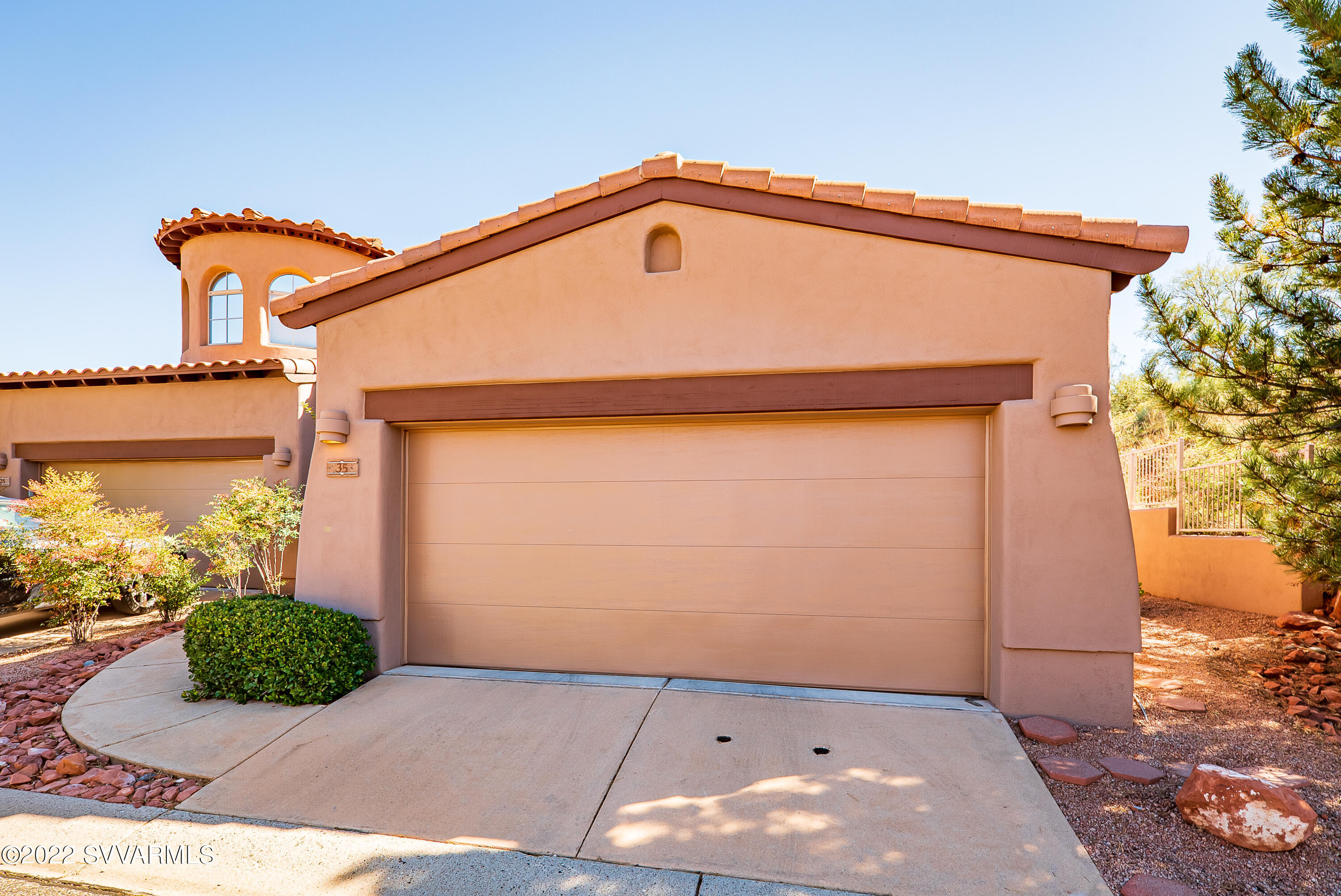 35 Rio Sinagua Sedona, AZ 86351 - Photo 49 of 67 a front view of a house with a yard