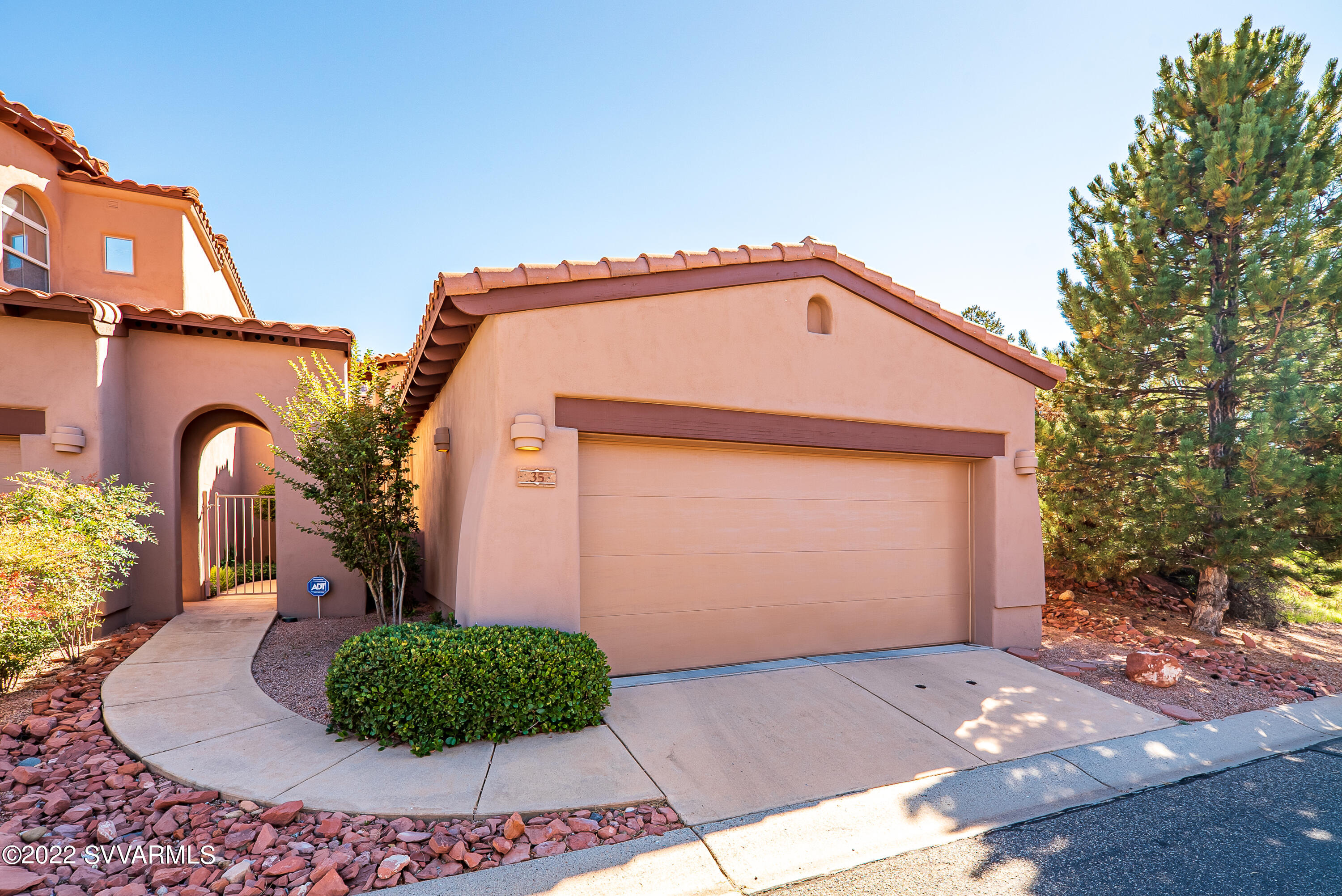 35 Rio Sinagua Sedona, AZ 86351 - Photo 50 of 67 a front view of a house with garden