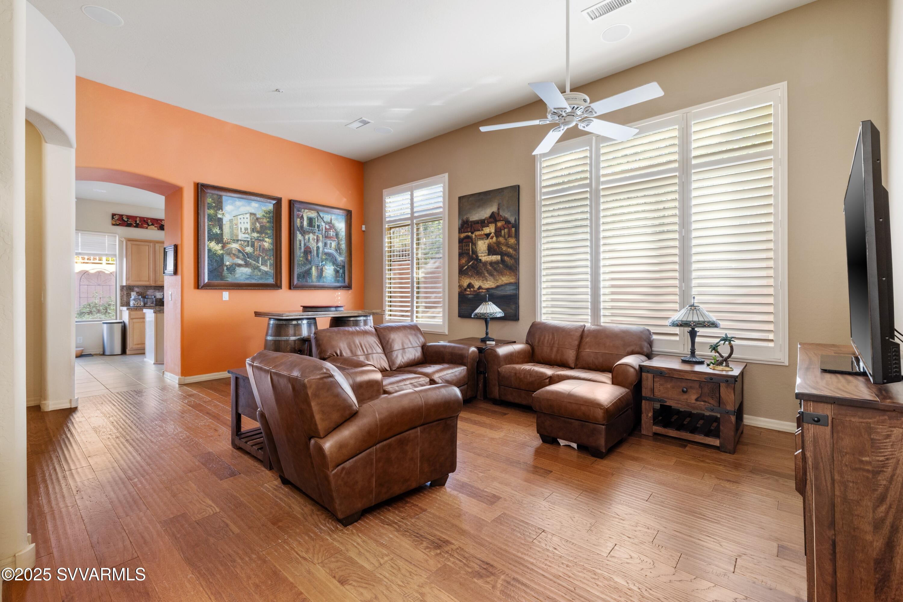 35 Rio Sinagua Sedona, AZ 86351 - Photo 9 of 67 a living room with furniture a flat screen tv and a large window