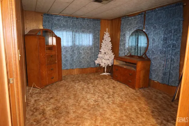 a view of kitchen island with wooden floor