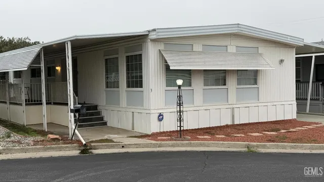 a front view of a house with a garage