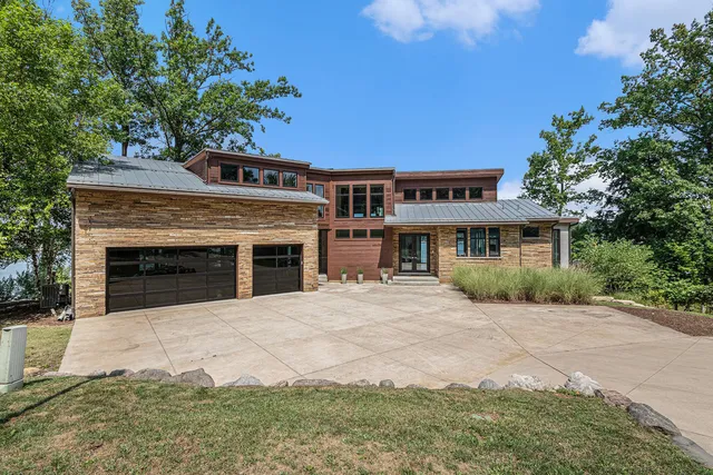 a living room with fireplace furniture and a flat screen tv