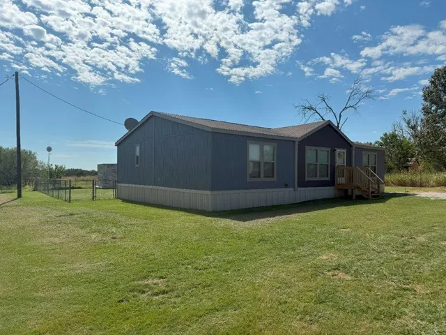 a house view with a garden