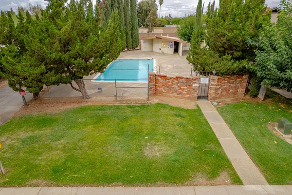 a view of a backyard with a garden