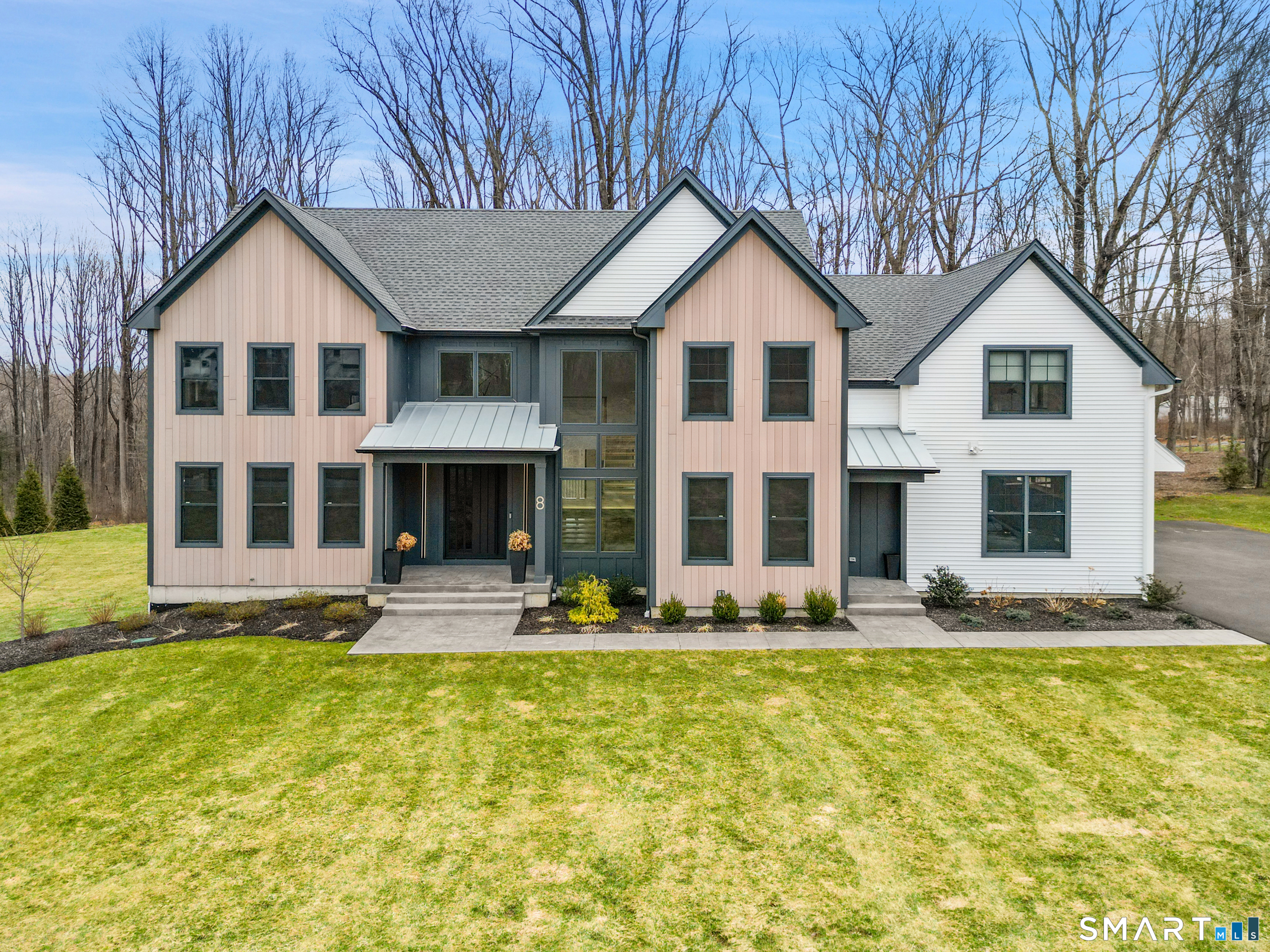 a front view of a house with swimming pool