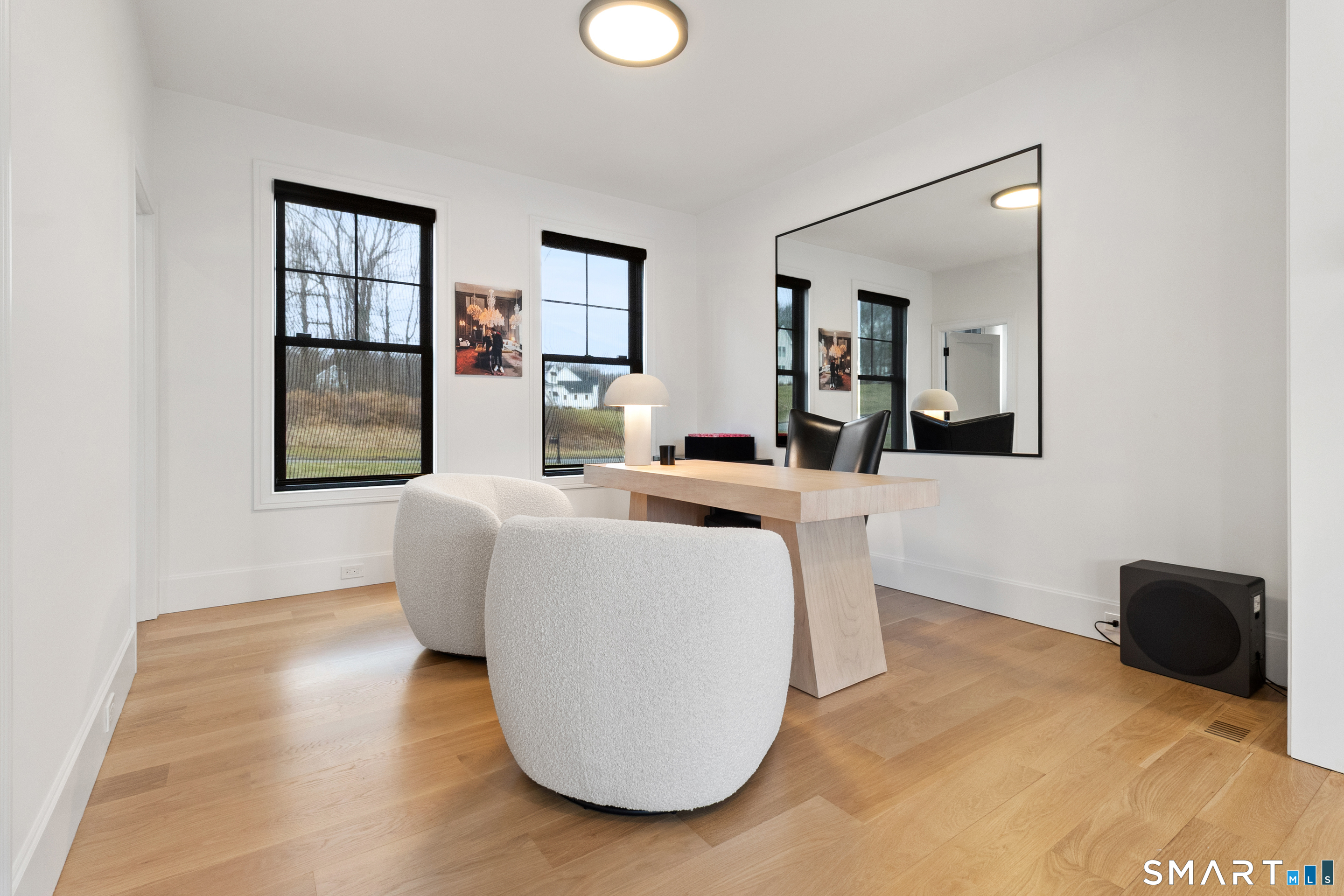8 Holly Lane Newtown, CT 06482 - Photo 11 of 36 a living room with furniture and window