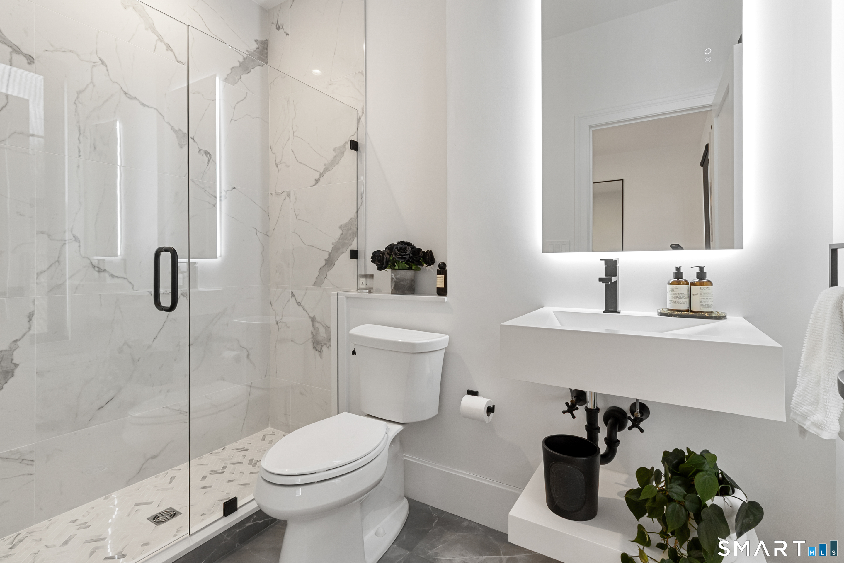 8 Holly Lane Newtown, CT 06482 - Photo 13 of 36 a bathroom with a sink toilet and shower