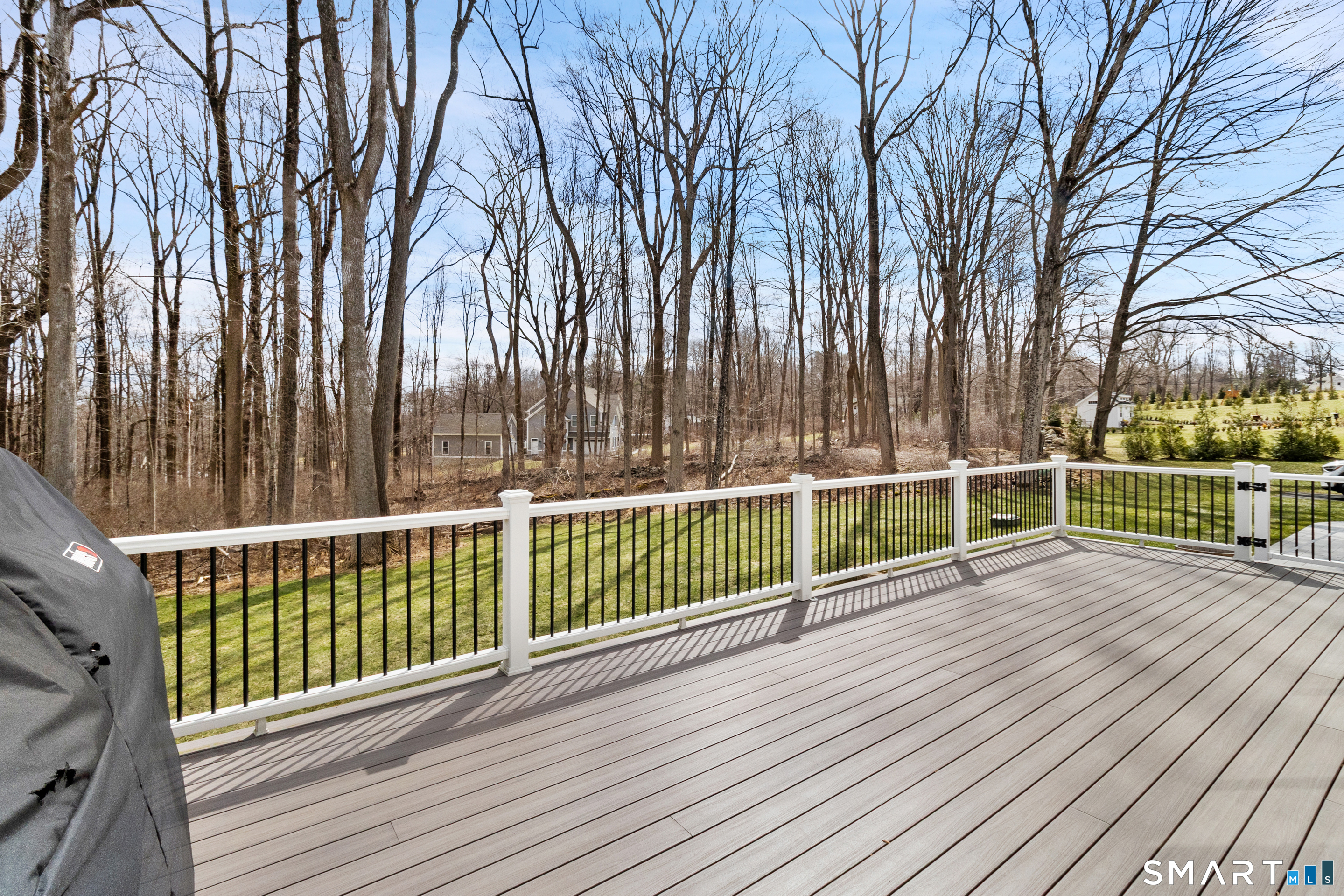 8 Holly Lane Newtown, CT 06482 - Photo 30 of 36 a view of a wooden deck