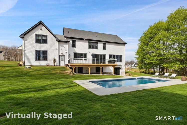 8 Holly Lane Newtown, CT 06482 - Photo 33 of 36 a view of a house with a big yard