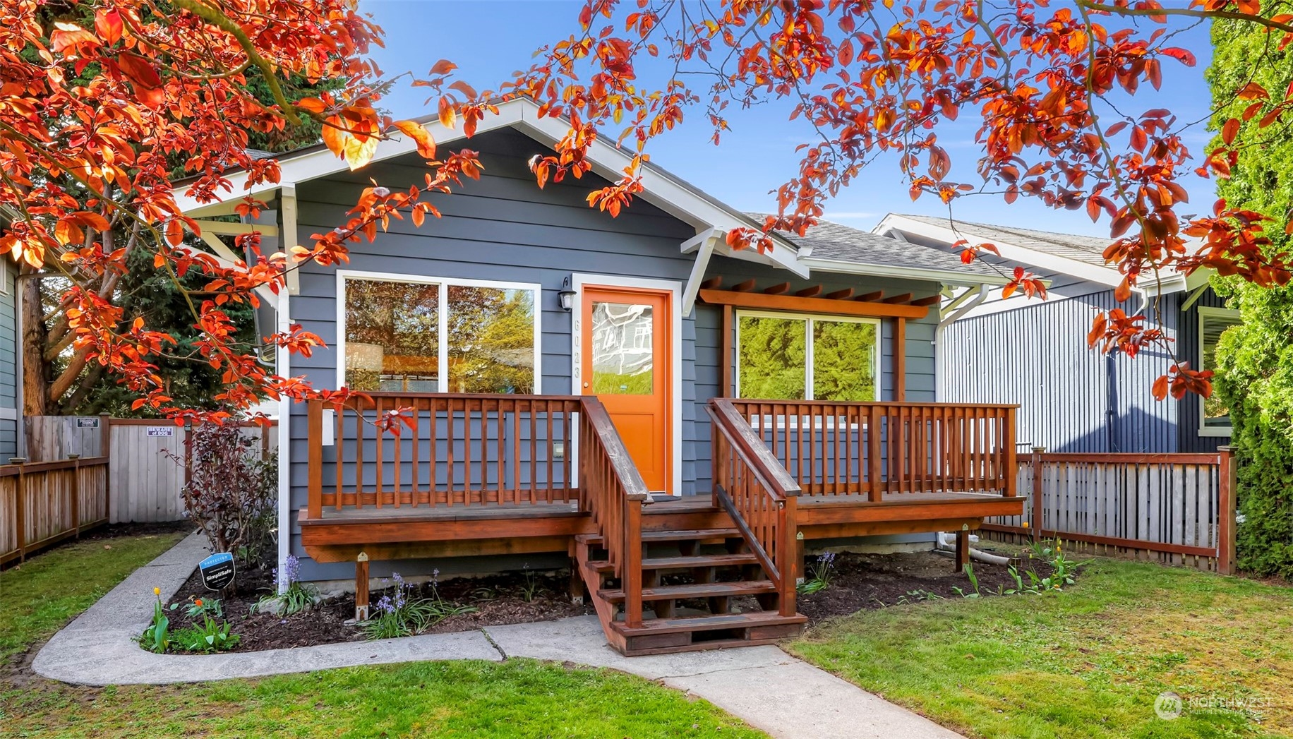 a view of backyard with deck