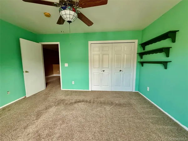 a view of a big room with a fireplace