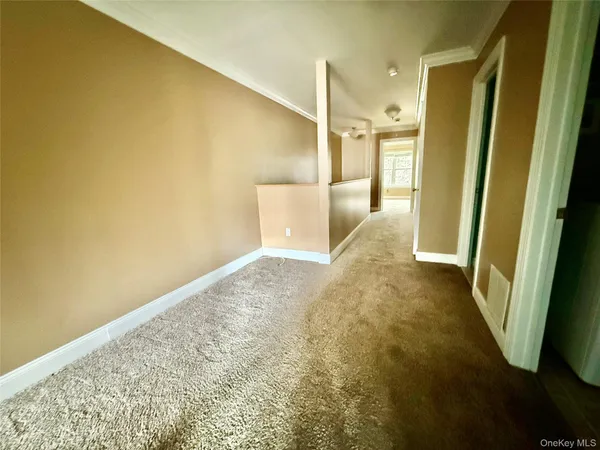a view of hallway with window