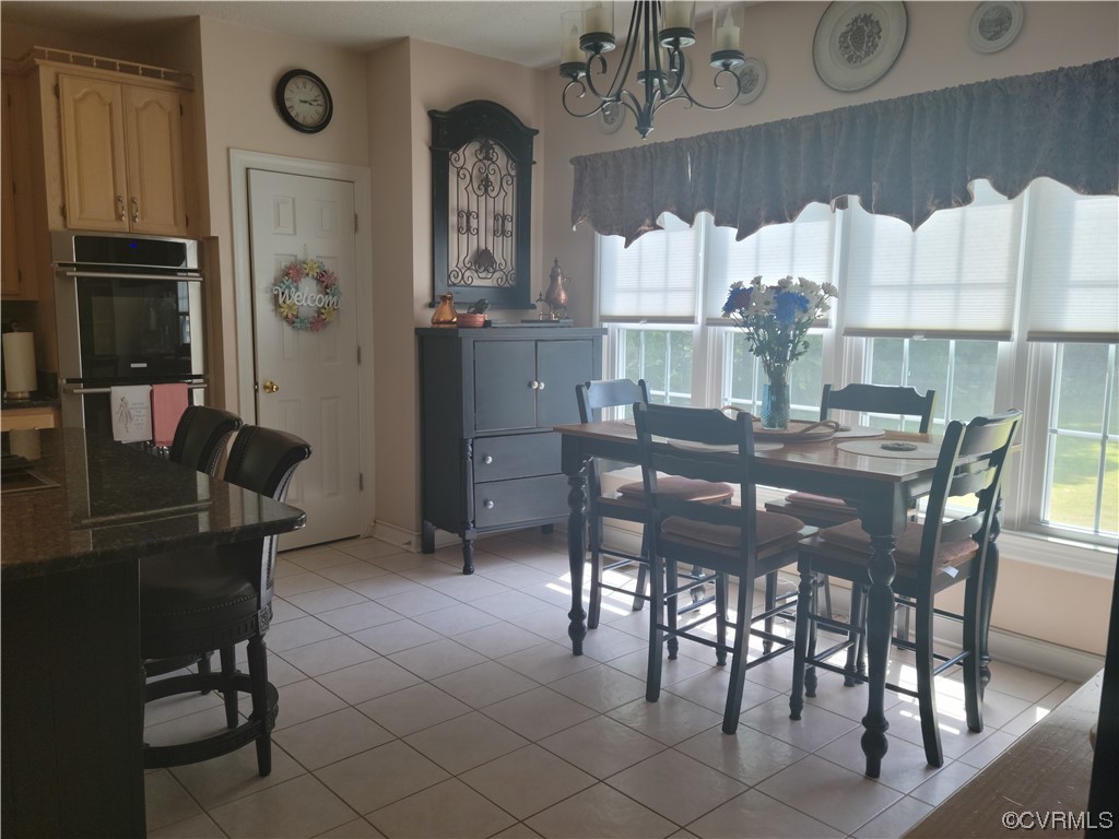 6373 Pine Slash Road Mechanicsville, VA 23116 - Photo 15 of 49 a view of a dining room with furniture