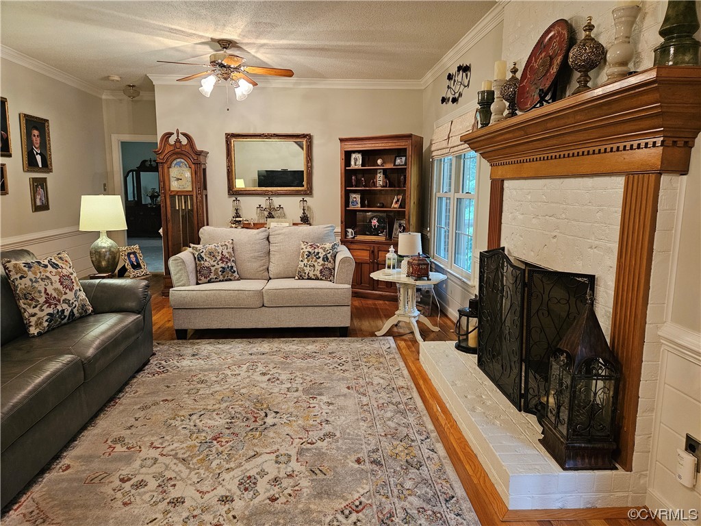6373 Pine Slash Road Mechanicsville, VA 23116 - Photo 18 of 49 a living room with furniture and a fireplace