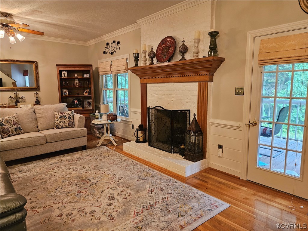 6373 Pine Slash Road Mechanicsville, VA 23116 - Photo 19 of 49 a living room with furniture and a fireplace
