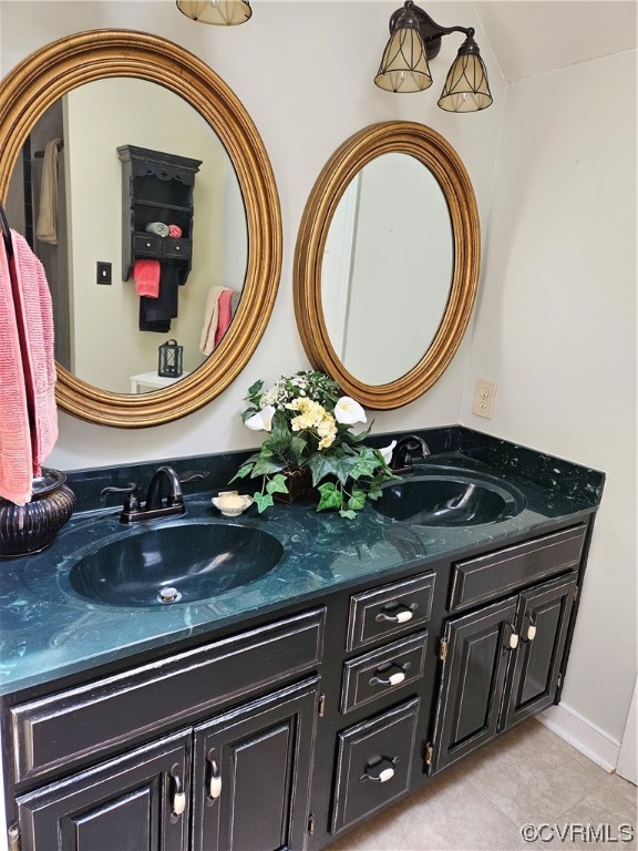 6373 Pine Slash Road Mechanicsville, VA 23116 - Photo 28 of 49 a bathroom with a granite countertop double vanity sink and mirror