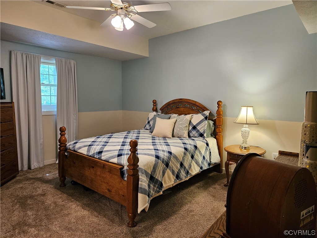 6373 Pine Slash Road Mechanicsville, VA 23116 - Photo 29 of 49 a bedroom with a bed and window