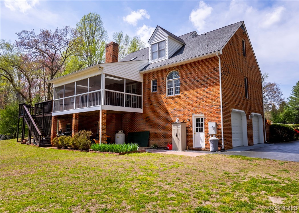 6373 Pine Slash Road Mechanicsville, VA 23116 - Photo 37 of 49 a view of a house with backyard porch and sitting area
