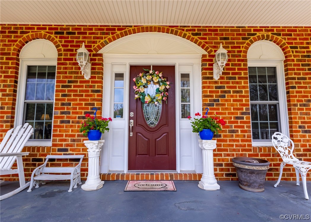 6373 Pine Slash Road Mechanicsville, VA 23116 - Photo 40 of 49 a front view of a house with outdoor seating