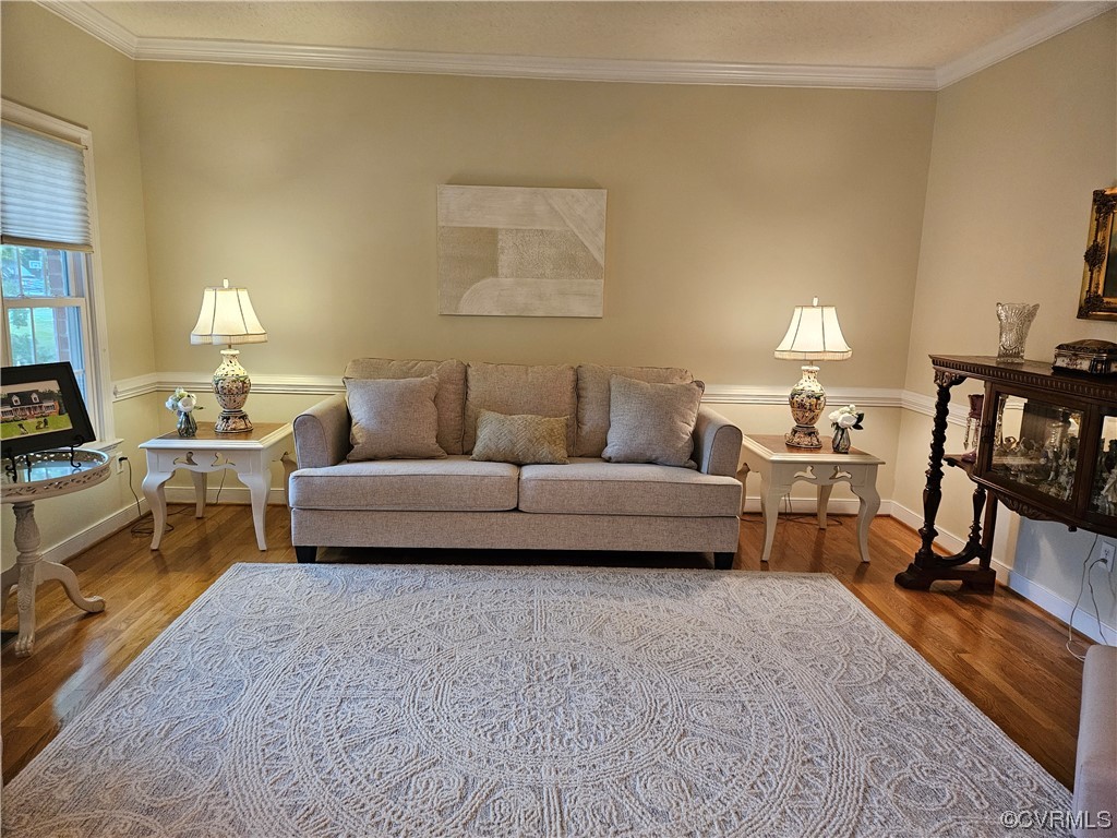6373 Pine Slash Road Mechanicsville, VA 23116 - Photo 4 of 49 a living room with furniture a lamp and a window