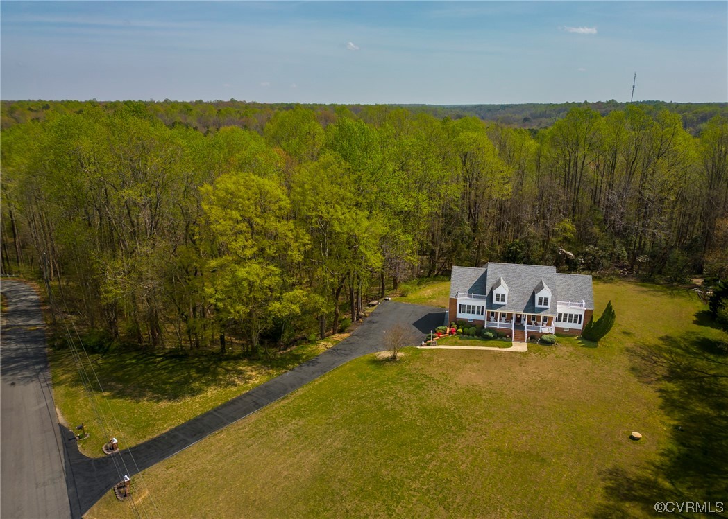 6373 Pine Slash Road Mechanicsville, VA 23116 - Photo 45 of 49 a view of a lake with lawn chairs