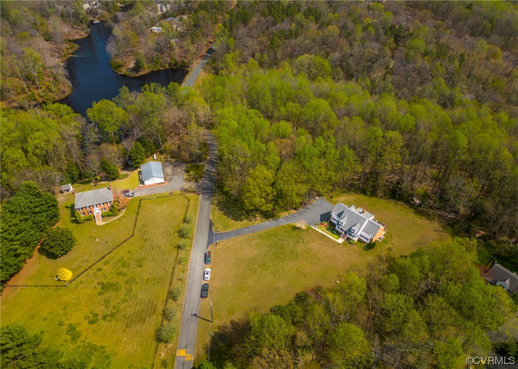 6373 Pine Slash Road Mechanicsville, VA 23116 - Photo 46 of 49 an aerial view of residential house with swimming pool