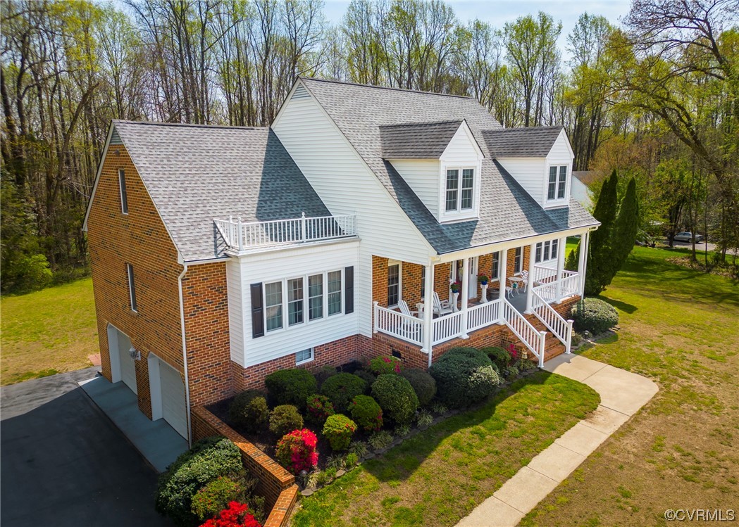 6373 Pine Slash Road Mechanicsville, VA 23116 - Photo 48 of 49 a front view of a house with garden
