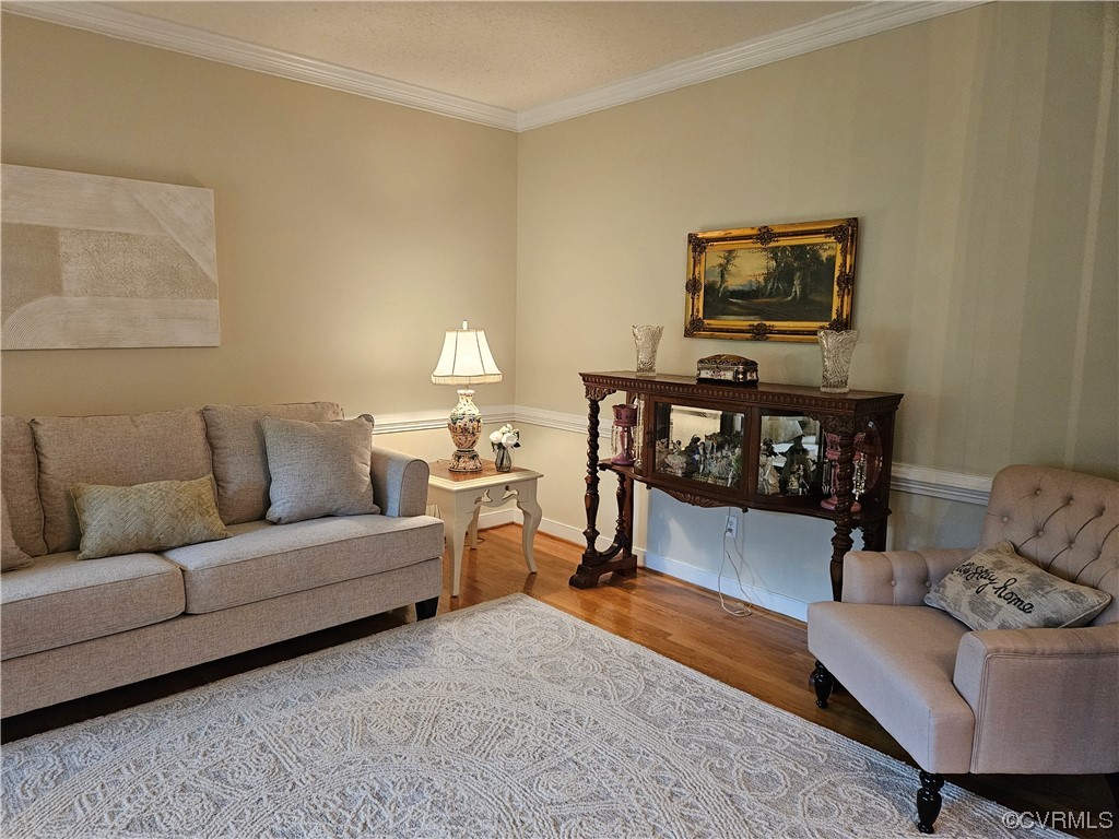 6373 Pine Slash Road Mechanicsville, VA 23116 - Photo 6 of 49 a living room with furniture and a wooden floor