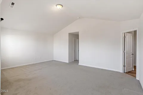 an empty room with an entryway