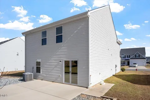 a view of a house with a patio